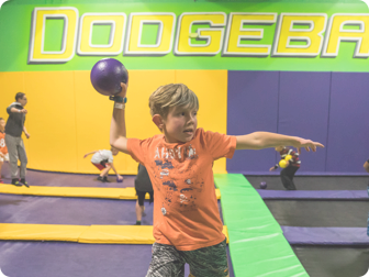 Boy playing dodgeball at Get Air.