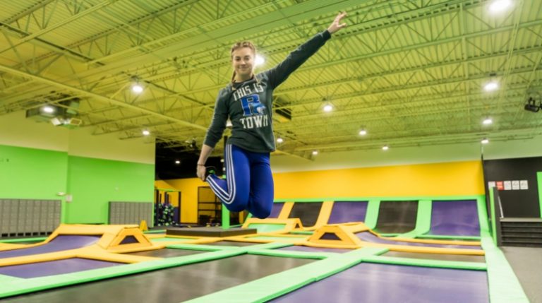 Girl jumping on trampolines at Get Air.